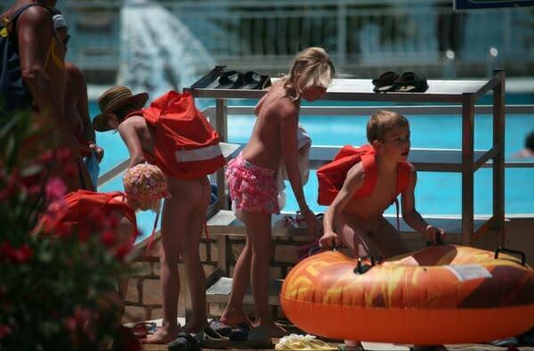 Children nudists in an aquapark