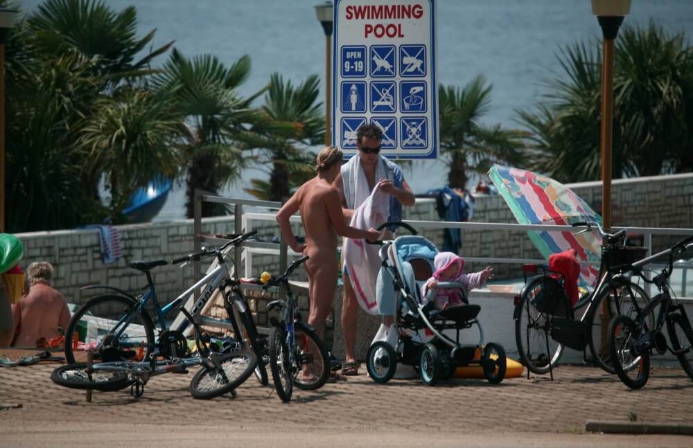 Poolside Camp Gathering pics - At the heart of nudism lies the idea of equality and respect for oneself and others