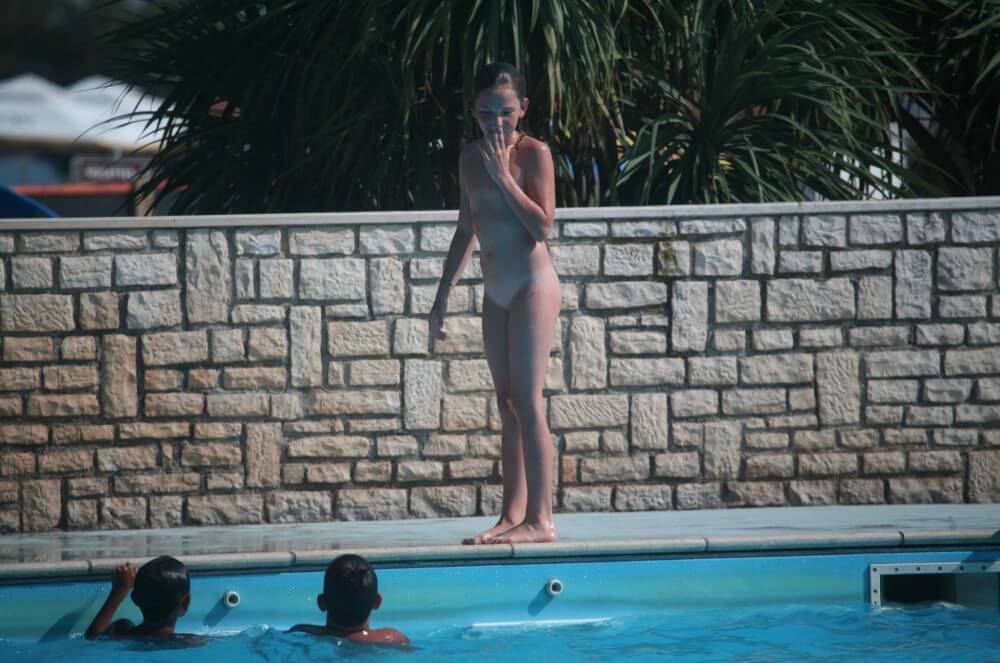 Naturist Pool-Side Singles photos - She appeared completely naked