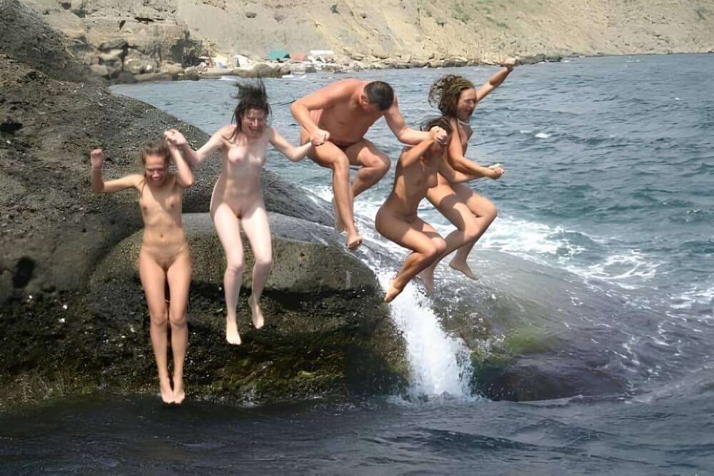 Mens and girls nudists on a beach - Taking Off Ones Clothes