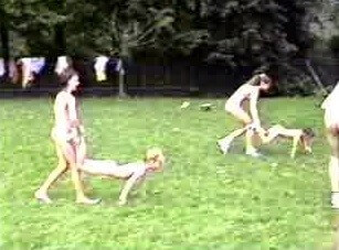 A nudist gathering at the stadium and sports - Naturism implies a life free of unnecessary problems