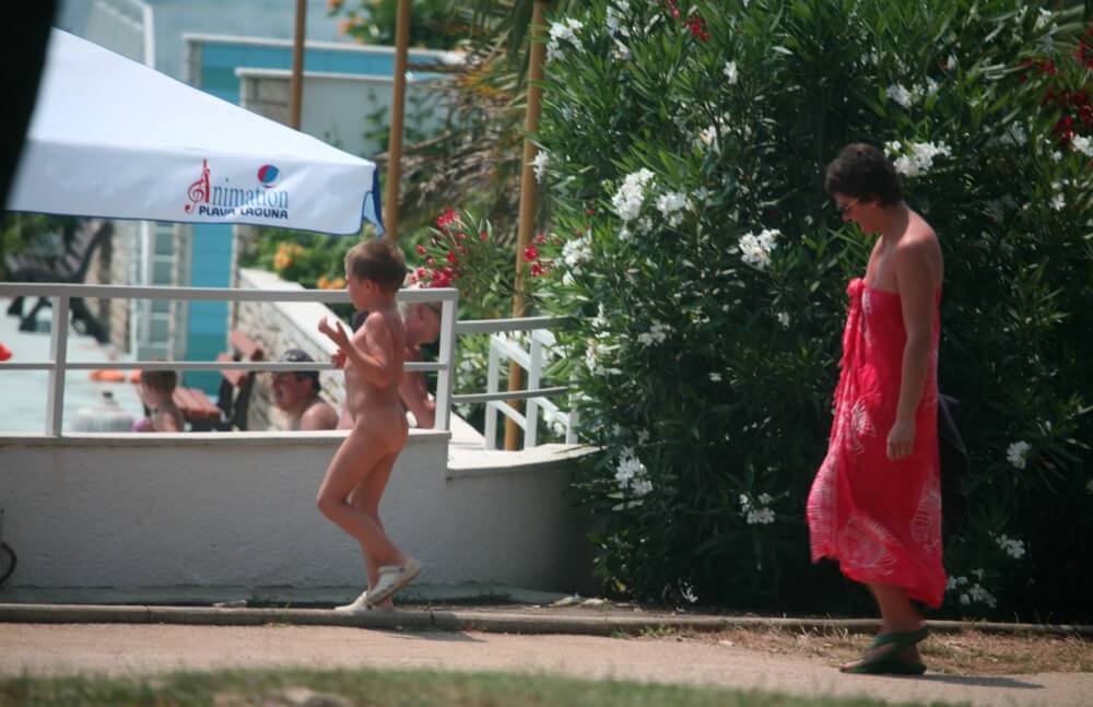 Naturist Pool Walkaround pics - Clothing is also a mask for a nudist