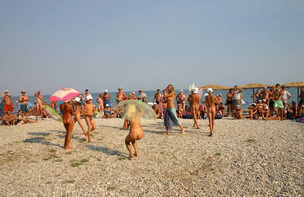 Ribbon and Umbrella Dance pics - A naked persons soul is visible through their body