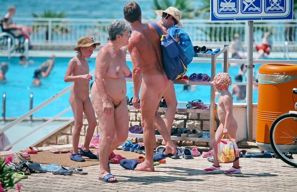 Family Poolside Grouping pics - Nudism fosters trust and mutual understanding