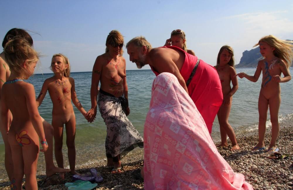 Water Drying Off pics - Harmony and balance are important in this nudist culture